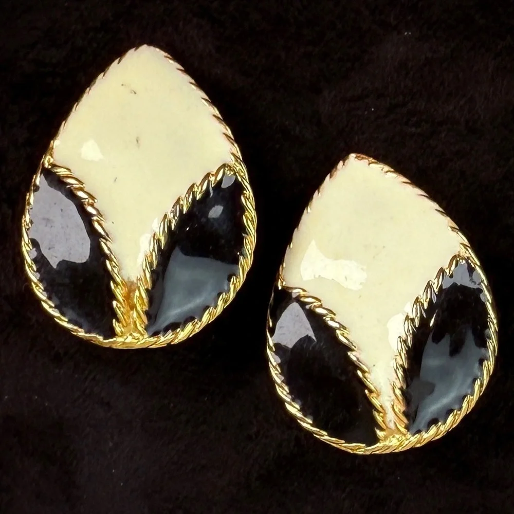 Vintage goldtone, black and cream enamel clip on earrings